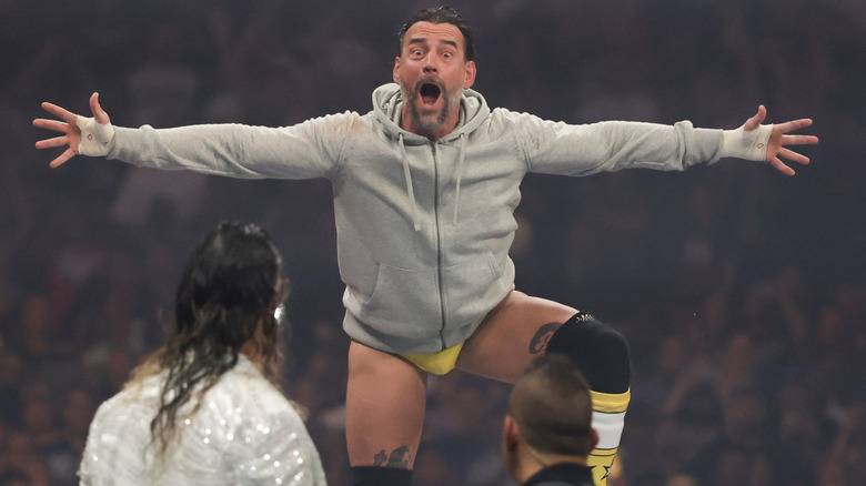 CM Punk yelling at Seth Rollins ahead of their Triple Threat main event match at WrestleMania 41, 2025.