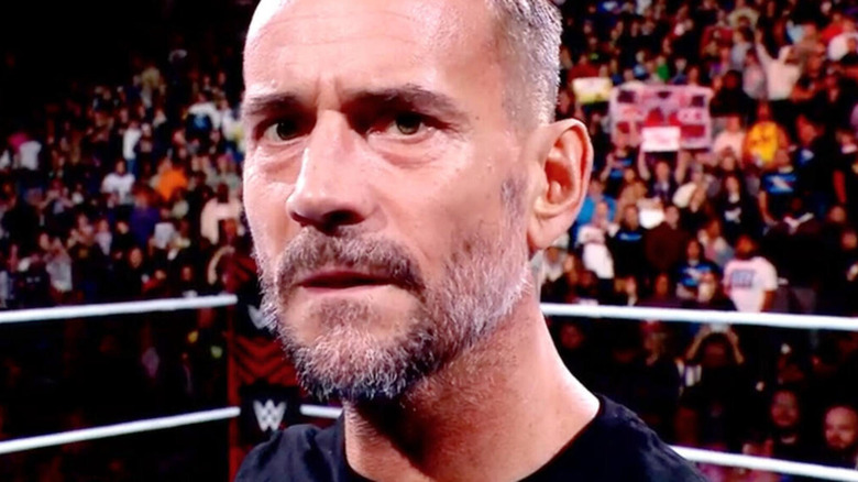 CM Punk stares into the camera.