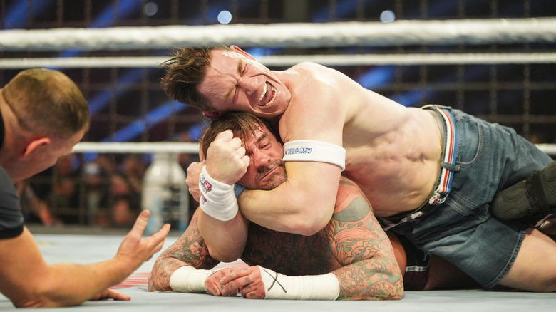 CM Punk and John Cena in the ring