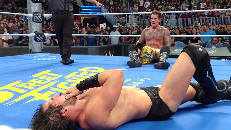 Johnny Gargano and CM Punk in the ring