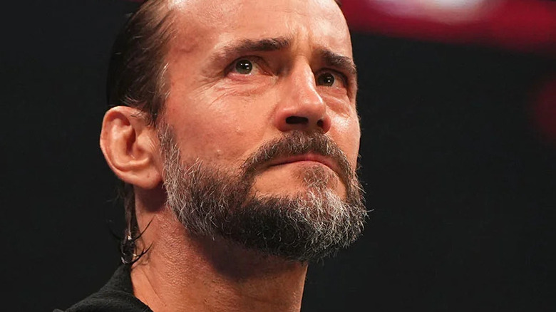 CM Punk looks concerned in AEW ring