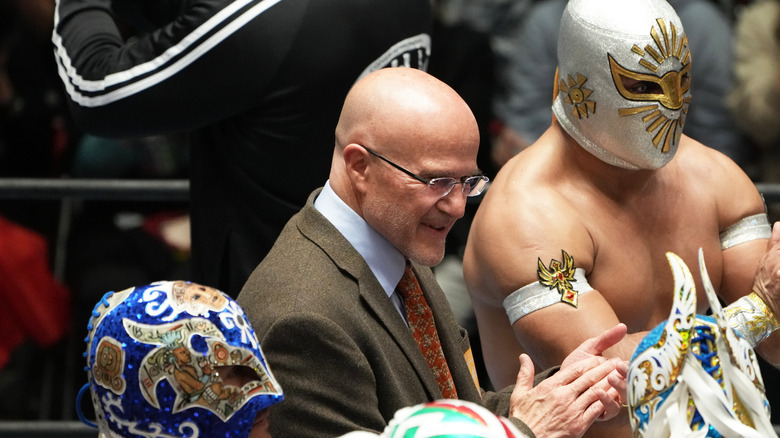 CMLL boss Salvador Lutteroth III with Mistico