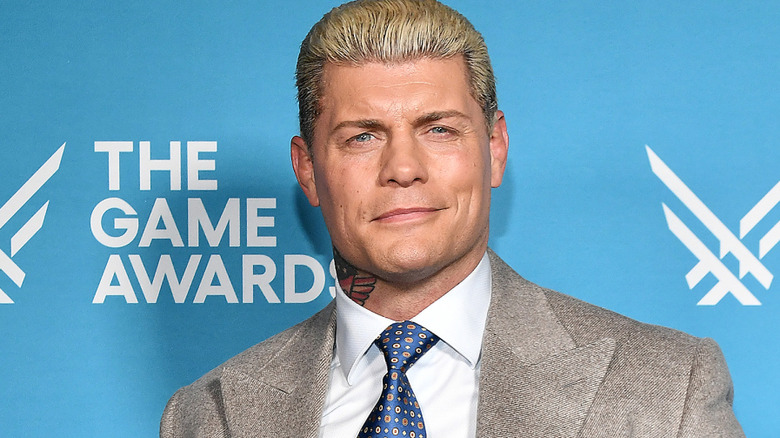 Cody Rhodes wearing a suit