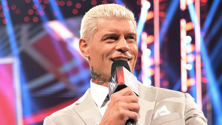 Cody Rhodes speaking on the microphone during an appearance on "WWE Raw"