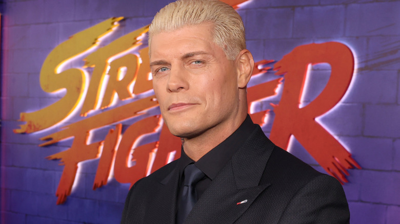 Cody Rhodes wearing a suit