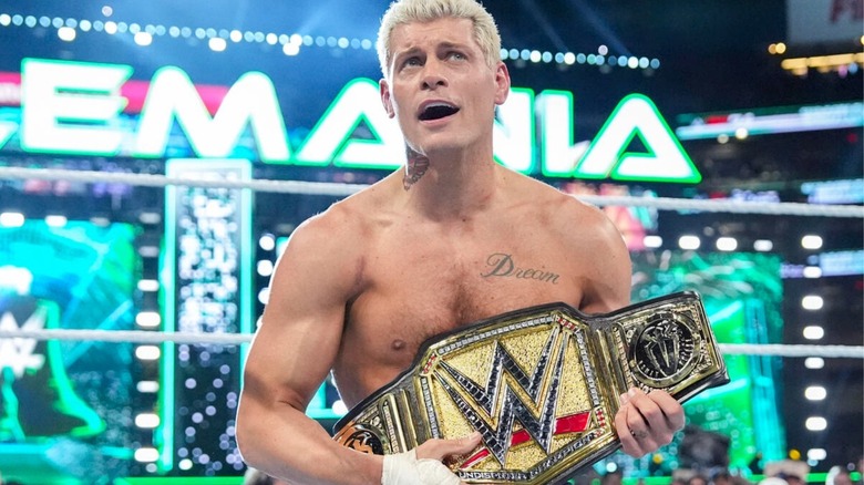 Cody Rhodes holding title