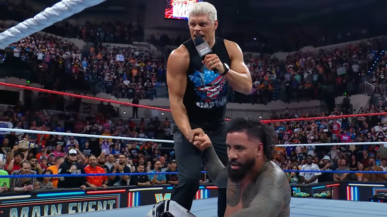 Cody Rhodes helps Jey Uso