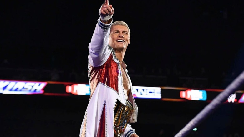 Cody Rhodes stands on the turnbuckle with the Undisputed WWE Championship around his waist before his match against AJ Styles at Backlash in Lyon, France.