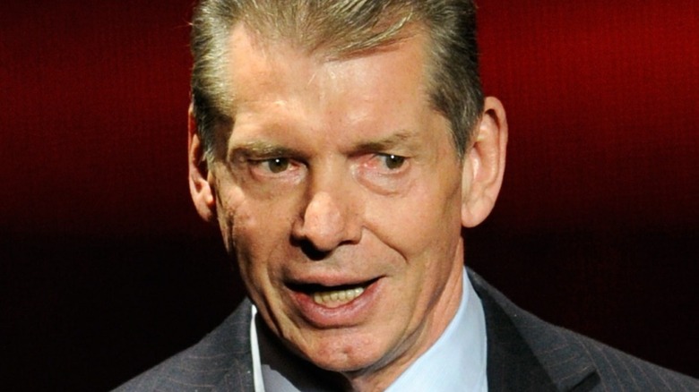 Vince McMahon talking on the mic