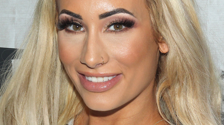 Carmella smiling