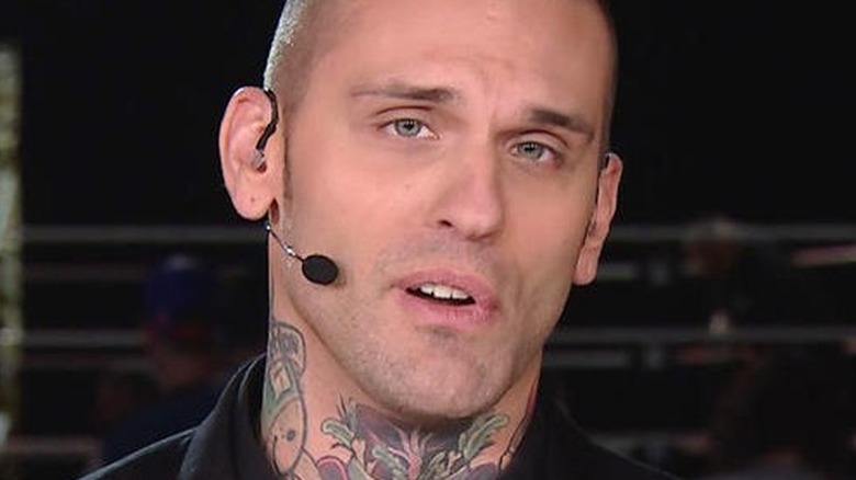 Corey Graves on a headset