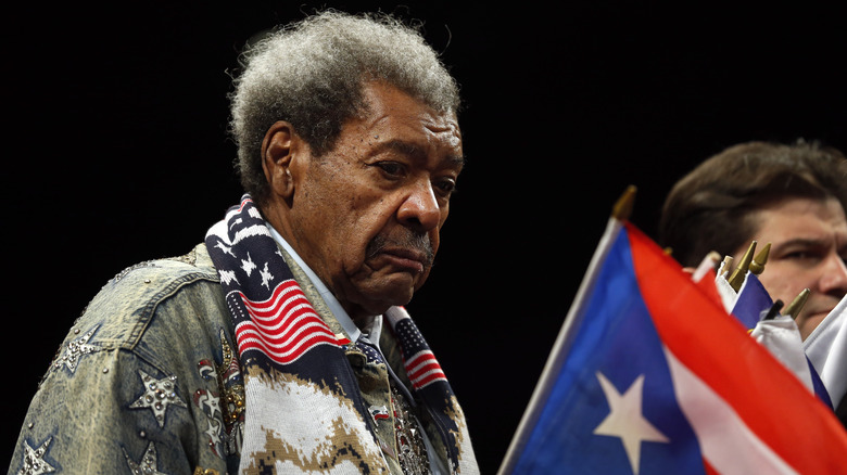 Don King holding flag of Puerto Rico