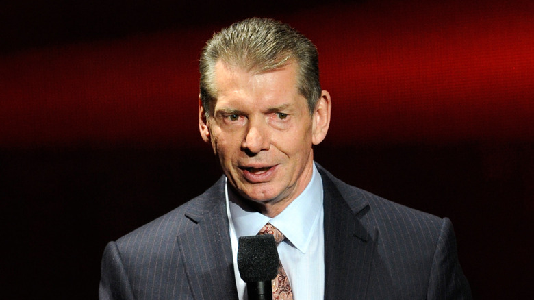 Vince McMahon with a microphone