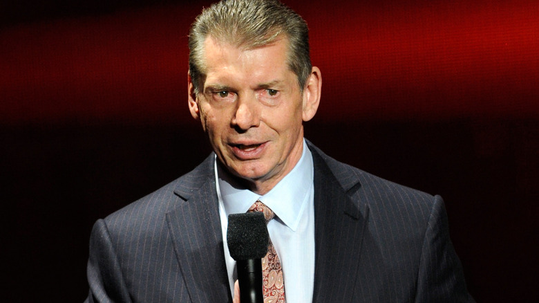Vince McMahon with a microphone