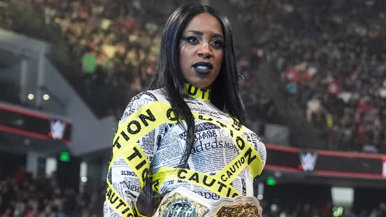 Naomi wearing her caution tape outfit