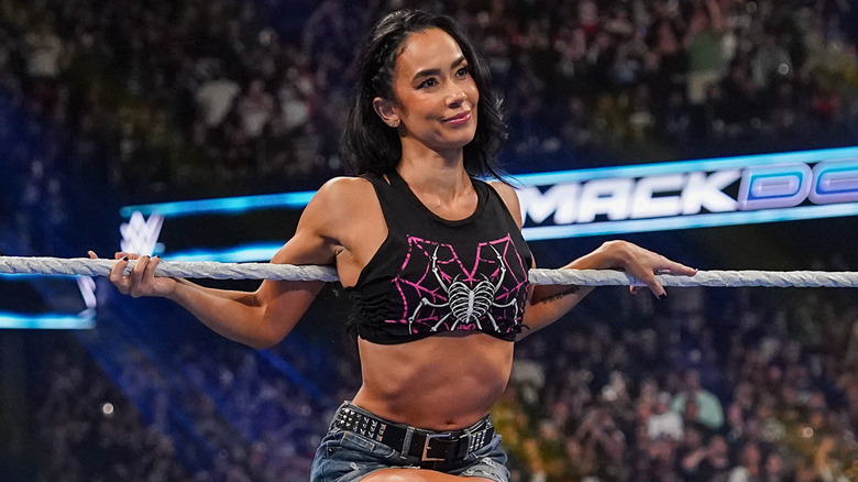 AJ Lee smiling in a WWE ring