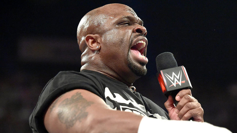 D-Von Dudley talking into a WWE microphone