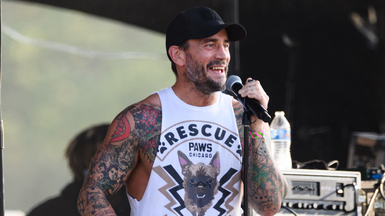 CM Punk talks on microphone