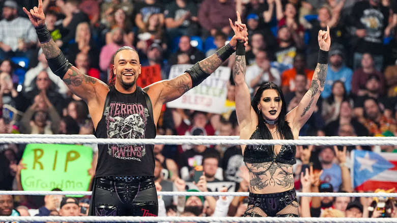 Damian Priest and Rhea Ripley celebrating on WWE SmackDown