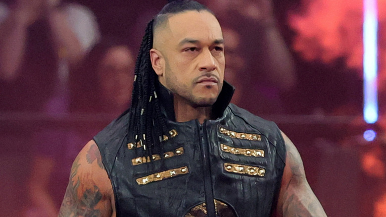 Damian Priest wearing a black vest jacket