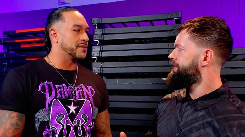 Damian Priest and Finn Balor talking