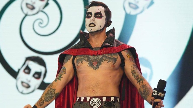 Danhausen, with a microphone in hand, is prepared to say something before one of his scheduled matches on AEW