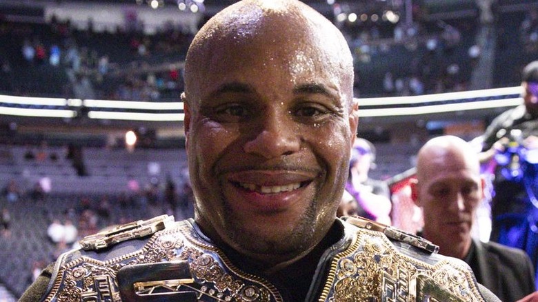 Daniel Cormier smiles as a double UFC Champion