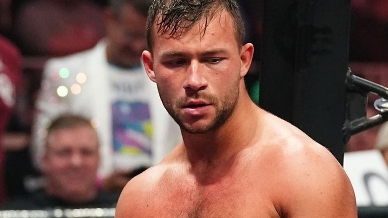 Daniel Garcia leaning on ring apron