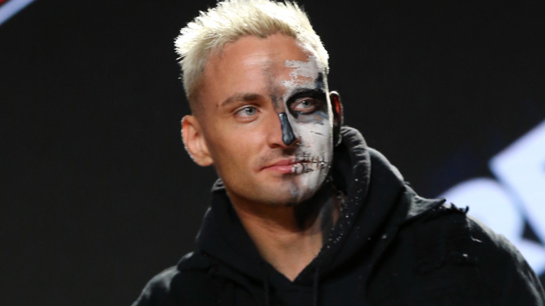 Darby Allin wearing black and white face paint