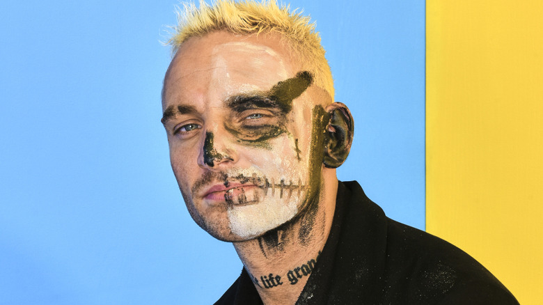 Darby Allin wearing black face paint