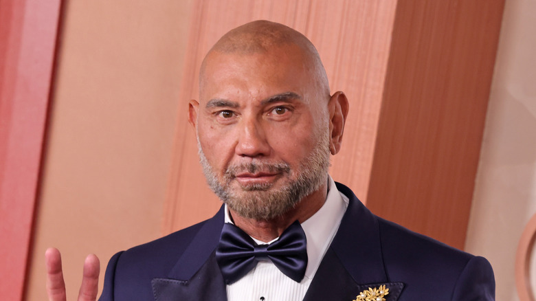 Dave Bautista holds up two fingers