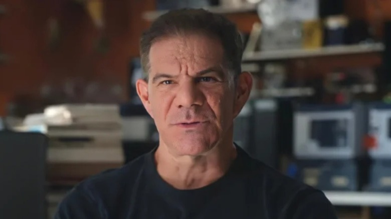 Dave Meltzer sitting in his office