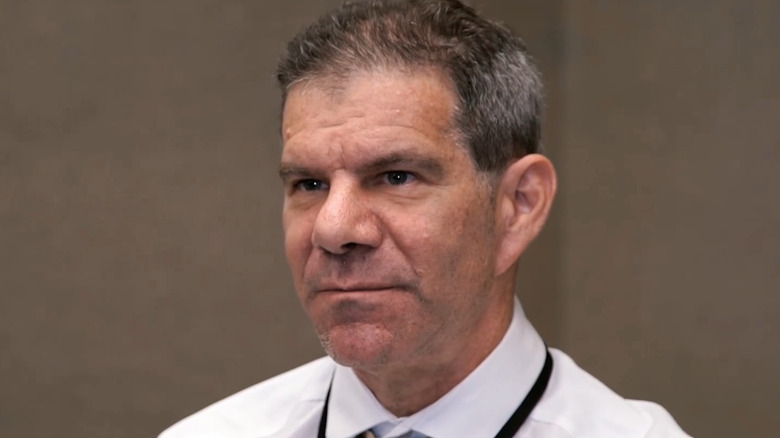 Dave Meltzer in a white dress shirt during an interview