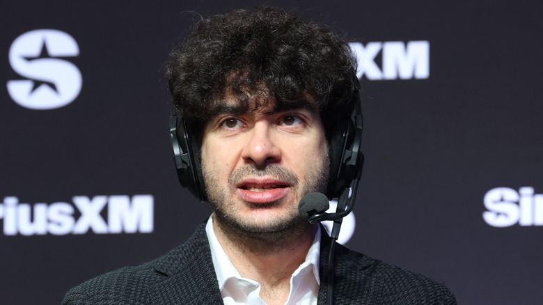 Tony Khan with the headset on and that look in his eye