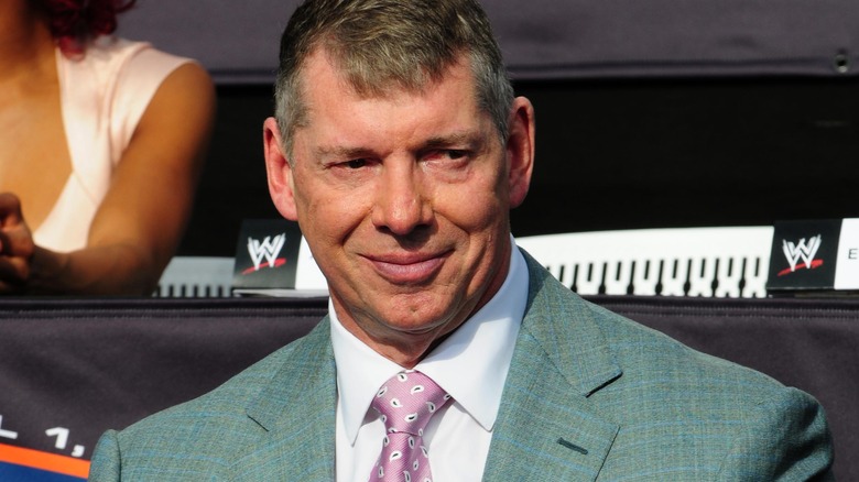 Vince McMahon smiles