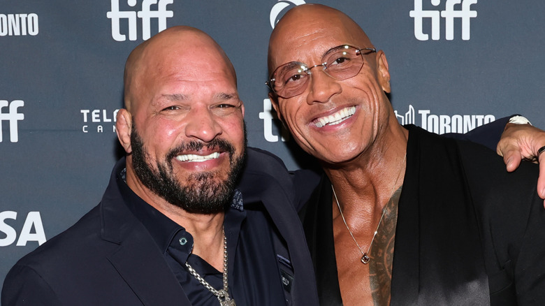 Mark Kerr and Dwayne Johnson attending the premier of 