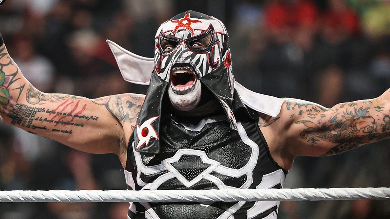 Penta celebrates after winning a qualifying match for the Men's Money in the Bank ladder match.