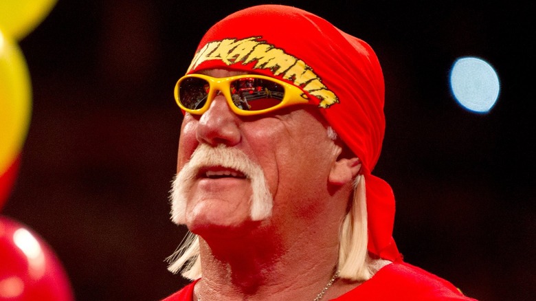 Hulk Hogan in red bandana and yellow sunglasses