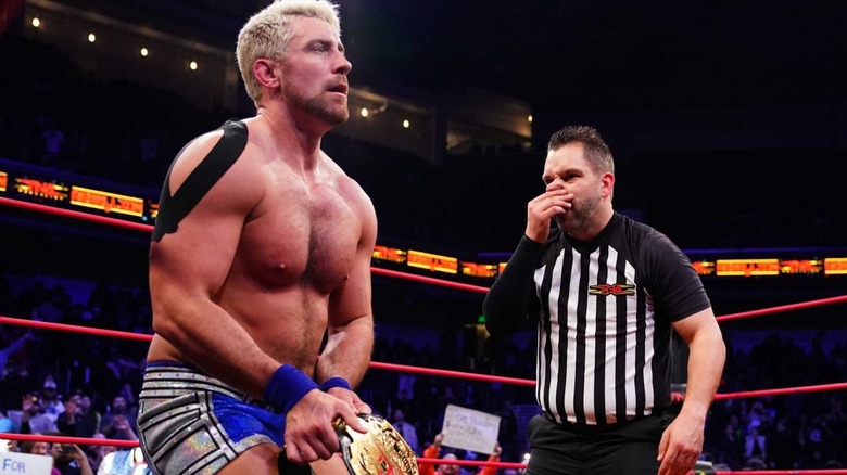 TNA World Champion Joe Hendry successfully retains his championship in a triple threat bout at Rebellion in April