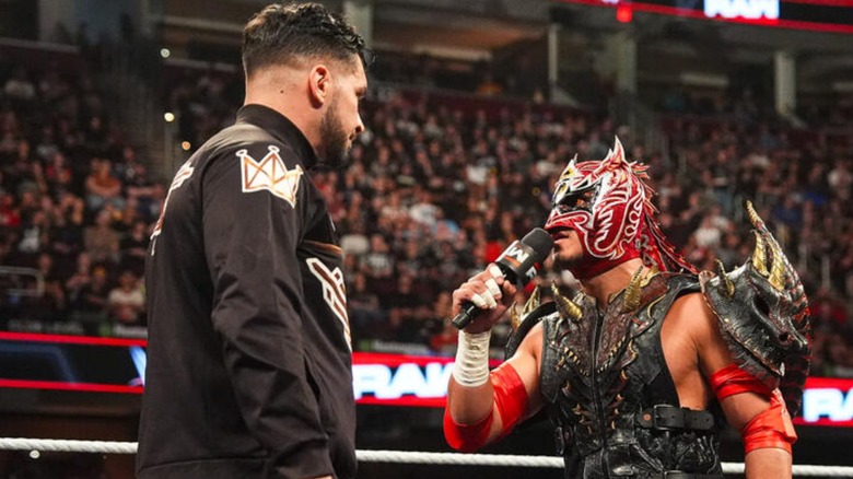 Ethan Page and Dragon Lee talking during a segment on 