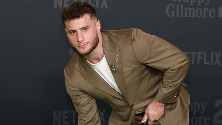 MJF in his golf stance