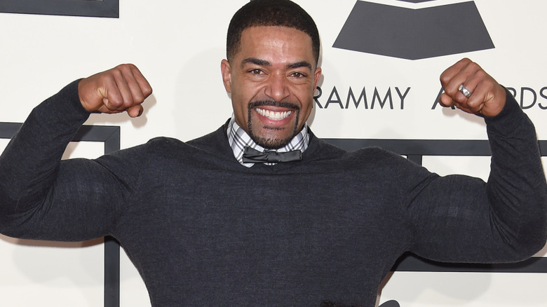 David Otunga is flexing his arms