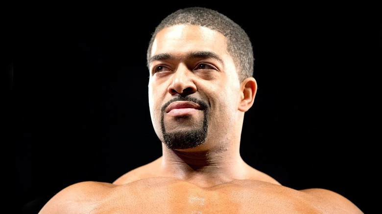 David Otunga in front of a black background