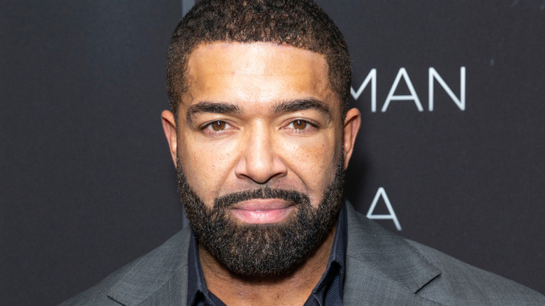 David Otunga poses on red carpet