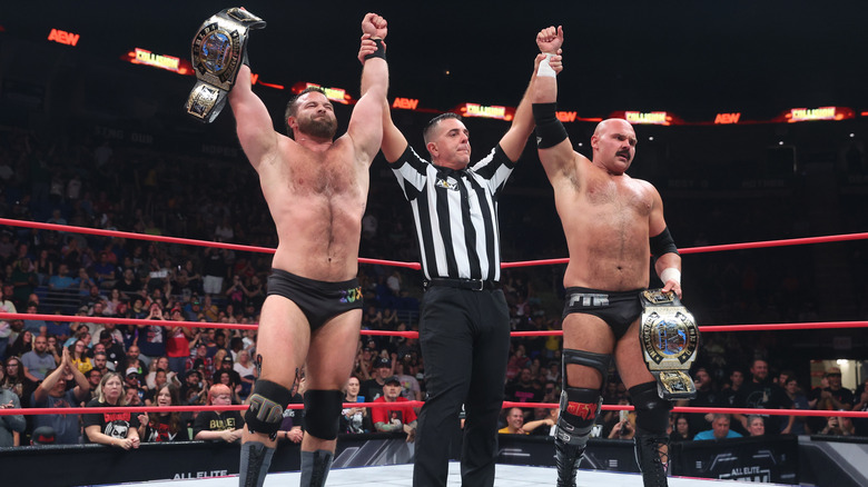 FTR holding the AEW World Tag Team Championships