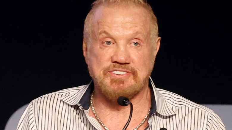 DDP speaking at a podium