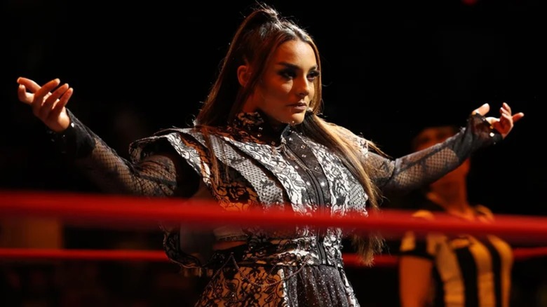 Deonna Purrazzo posing in the ring ahead of a match.