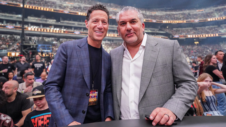 Nick Khan pictured next to Mark Shapiro