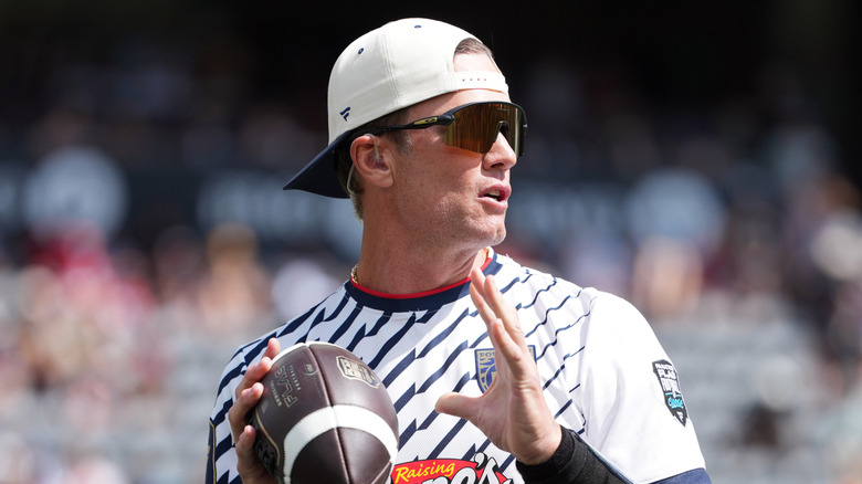 Tom Brady gets ready to throw a football
