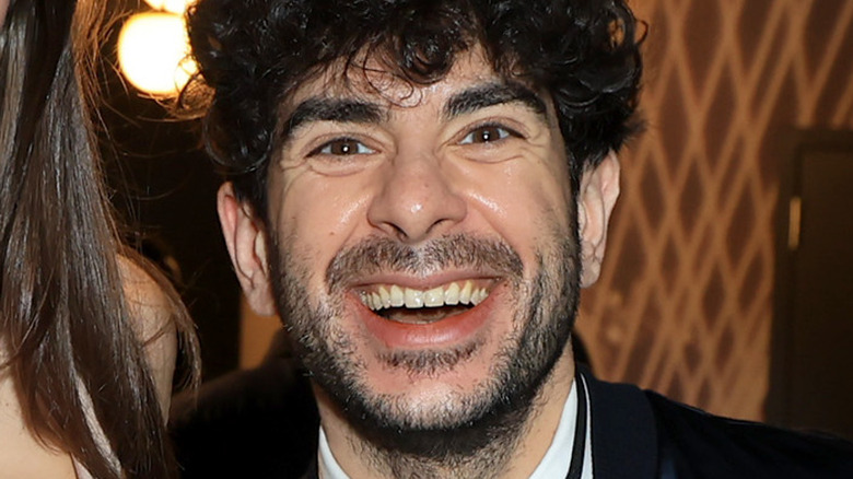 AEW CEO Tony Khan smiling